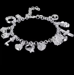Sterling Silver Charm Bracelet.